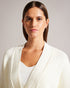 JOLALYY-Knitwear-Keep warm and comfortable in JOLALYY. Made from a cotton blend, this timeless cardigan is versatile enough to wear to brunch or throw over a tee for an extra layer on cooler days. Cardigan Relaxed fit Cotton blend Classic knit Ribbed Button fastening Deep V-neck Magnolia branded detail- Ted Baker Romania